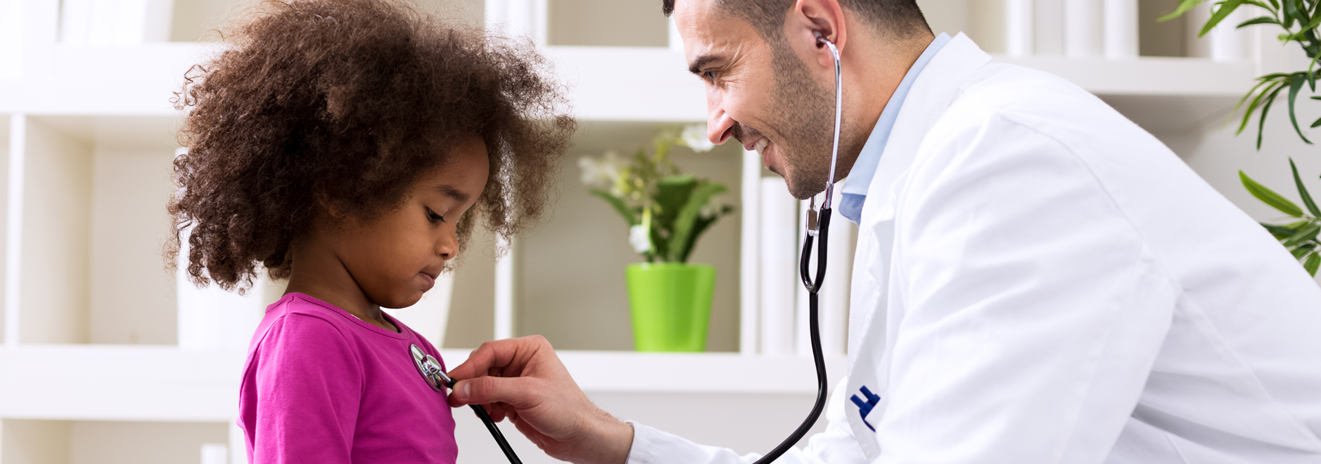 doctor examining girl